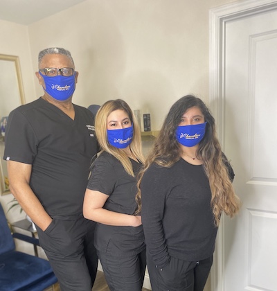 The Chameleon MedSpa team and Dr. Boyd wearing masks